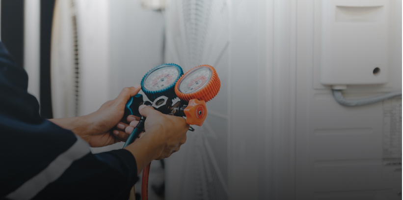 Person holding air conditioning tools