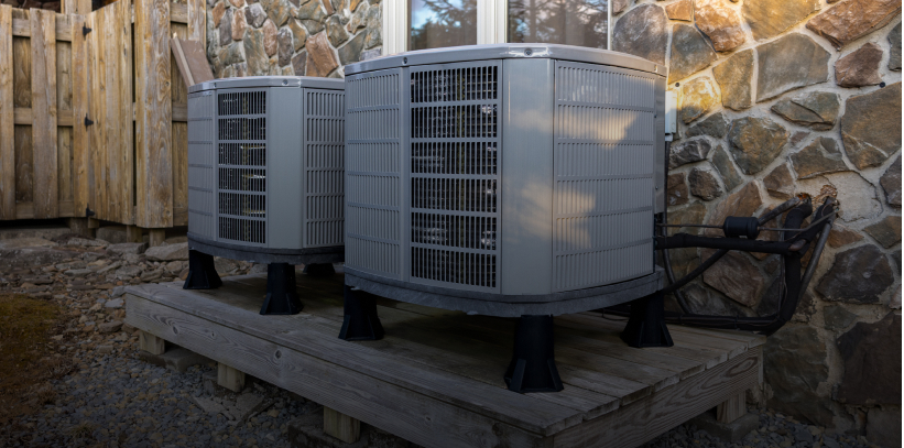 Residential air conditioning units outside house